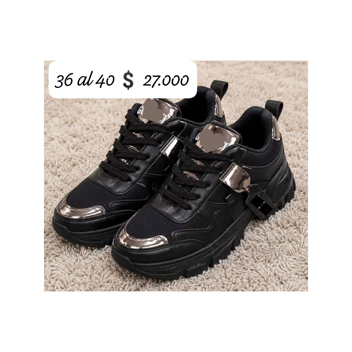 Zapatillas negras con detalle plateado