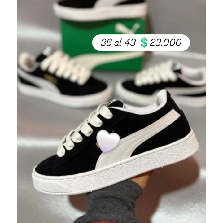 Zapatillas con corazón blancas y negras