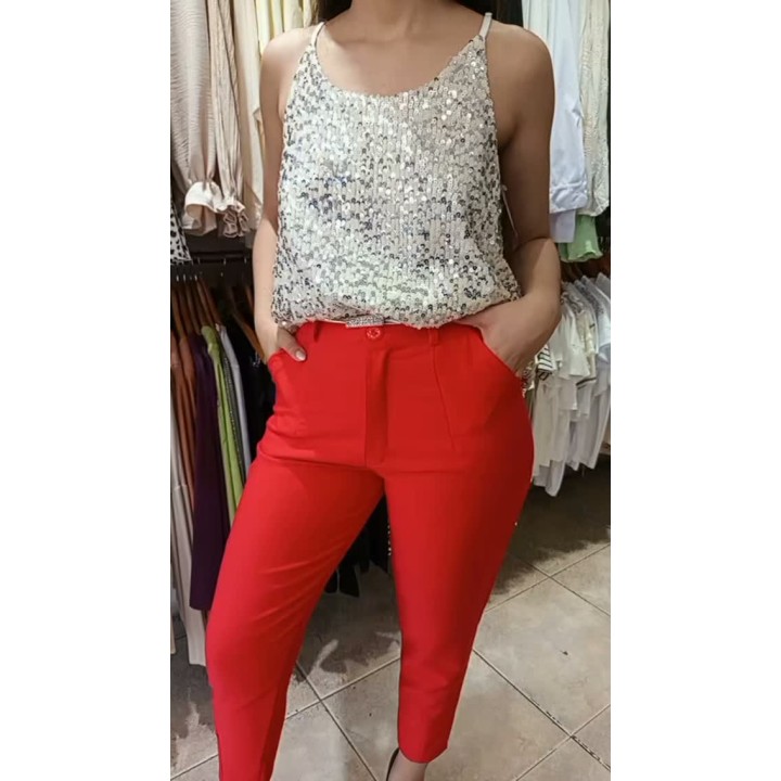Musculosa lentejuelas, pantalón sastrero clásico